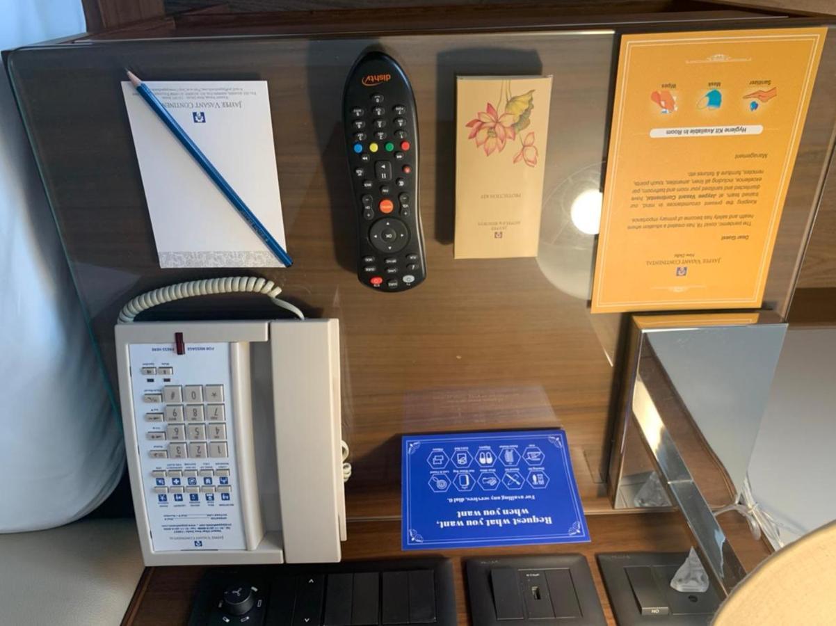 Jaypee Vasant Continental Hotel New Delhi Exterior photo A telephone in a hotel room