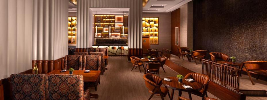 Jaypee Vasant Continental Hotel New Delhi Exterior photo The Bar