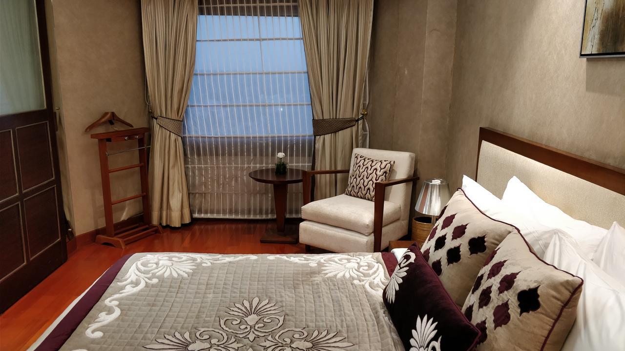 Jaypee Vasant Continental Hotel New Delhi Exterior photo A bedroom at the hotel